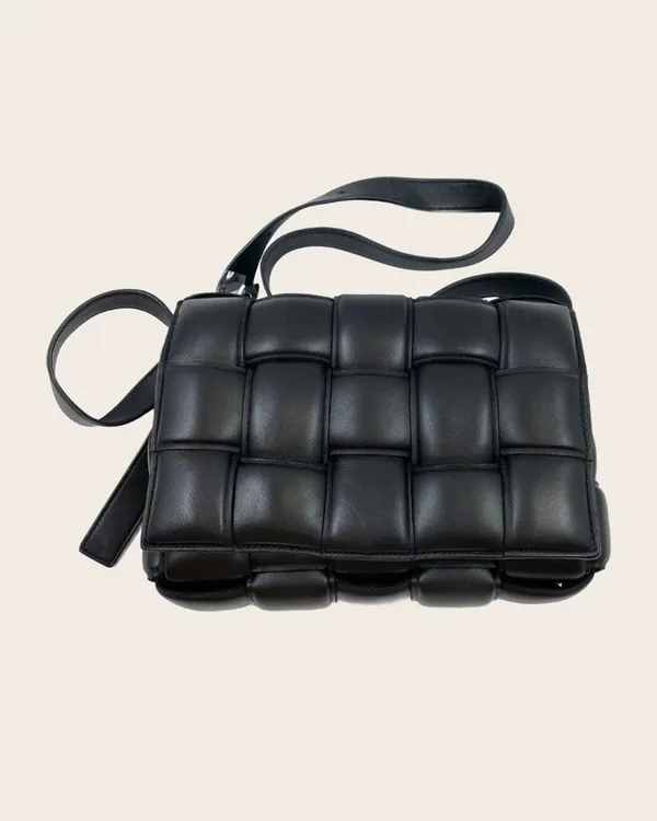 Bottega Veneta Padded Cassette in black Intrecciato lambskin