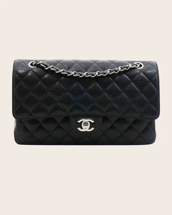 Chanel Classic Flap Medium in black caviar with silver hardware